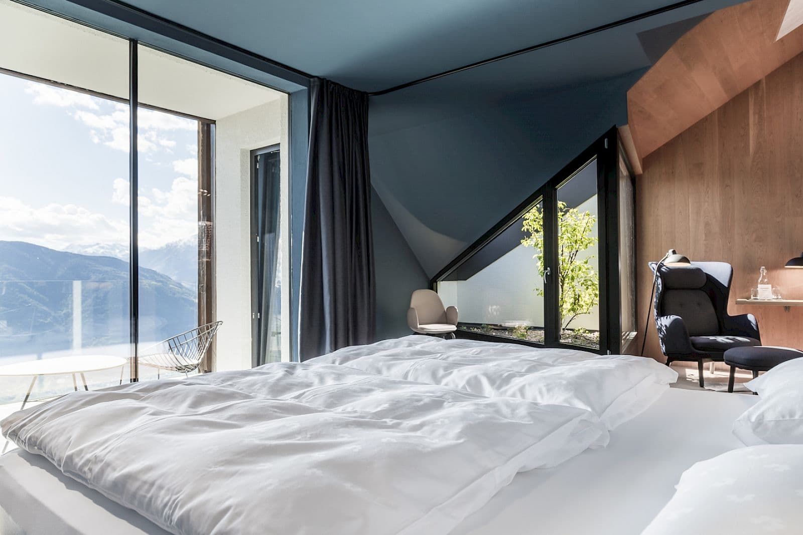 Miramonti — floor-to-ceiling window framing the Dolomites, South Tyrol