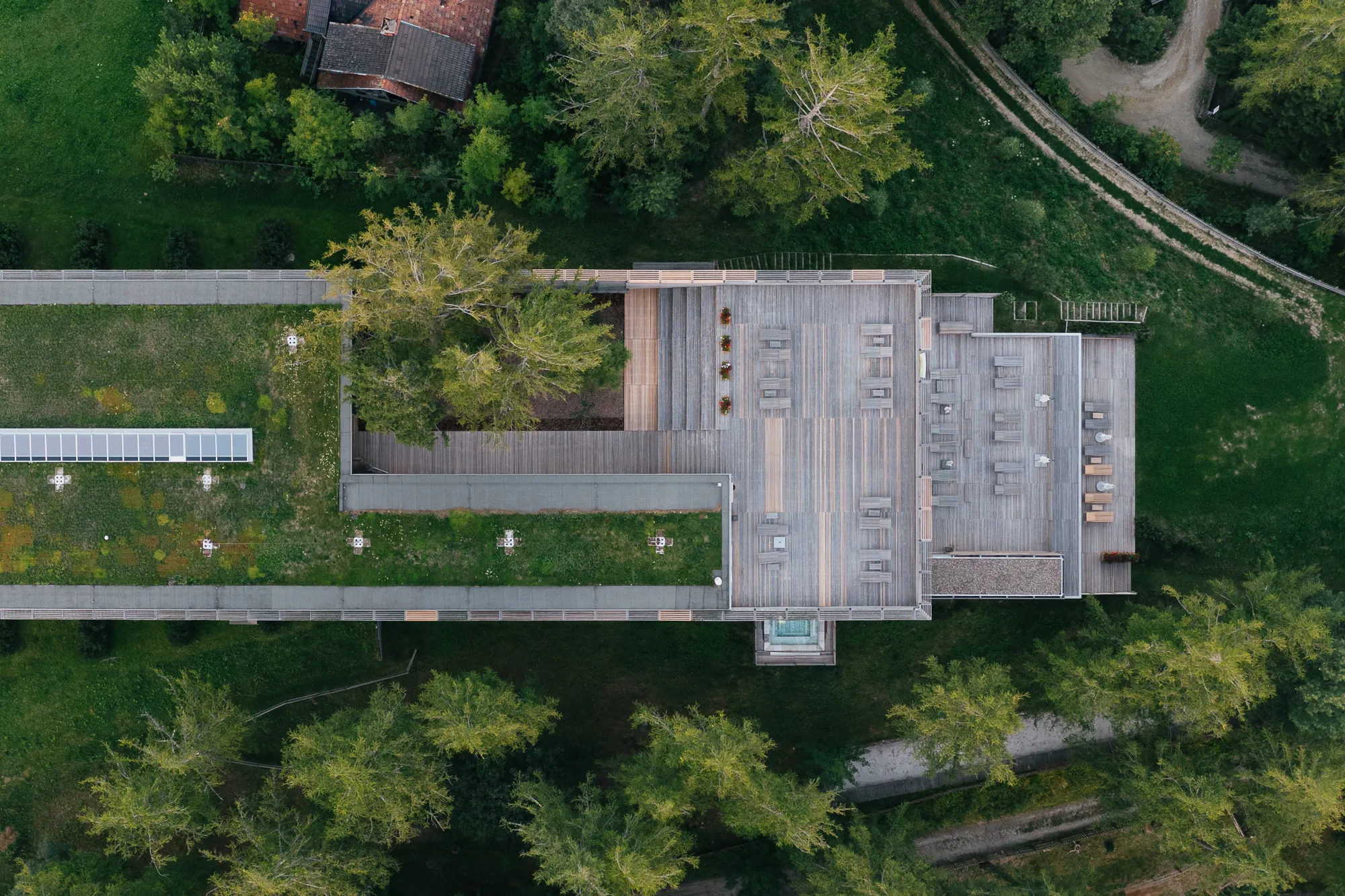 Aerial view of the green roof and architecture of vigilius mountain resort by Matteo Thun.