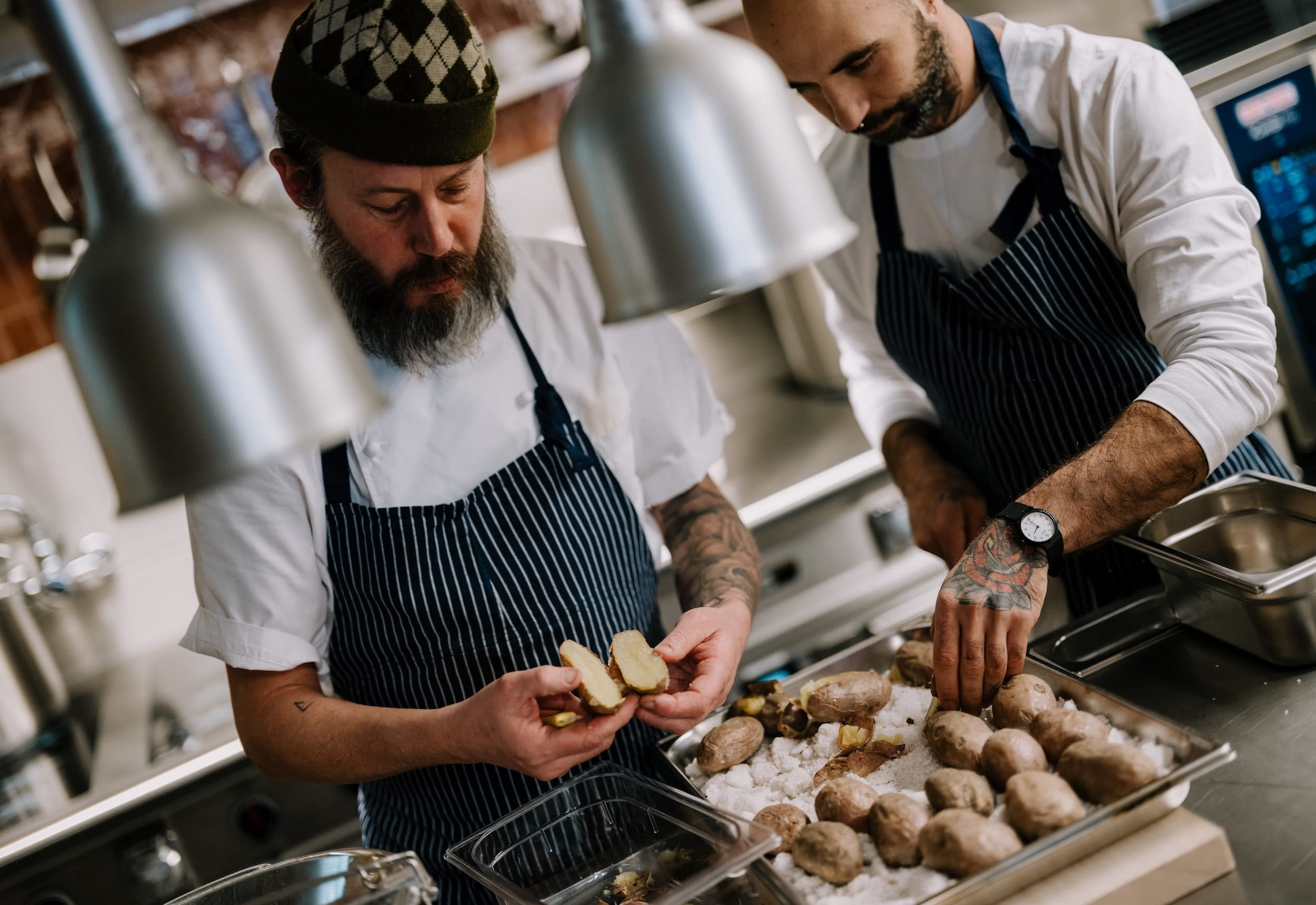 Chesa Marchetta — Chefs making gnocchi in the kitchen
