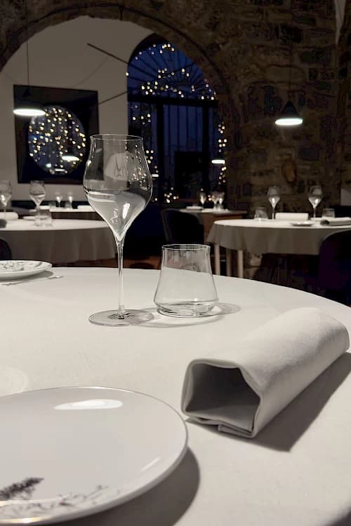 Feel Como — Dining room with vaulted stone arches, Lake Como