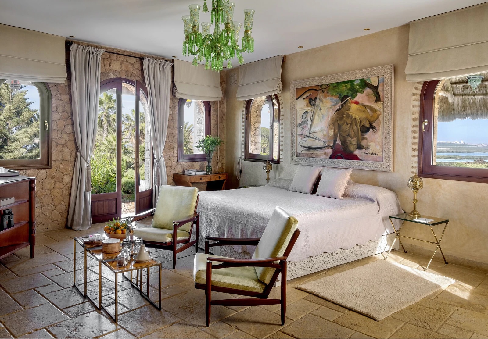 The Lagoon Suite, with a double bed, seating area and a window onto the lagoon. Photo: La Sultana Oualidia